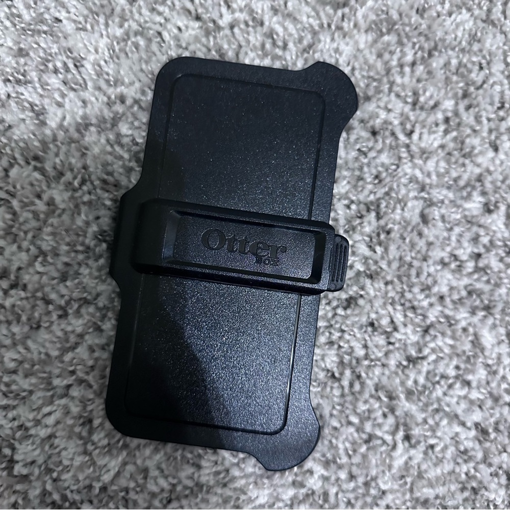 Black Otterbox clip on phone case